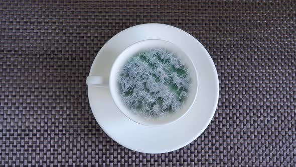 Sea Waves in a Cup