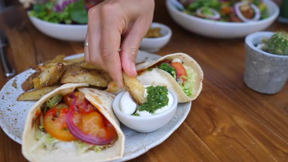 Healthy Plant Based Lunch of Wraps and Potatoes on a Side