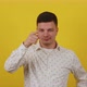Young Guy Posing on a Yellow Background - VideoHive Item for Sale