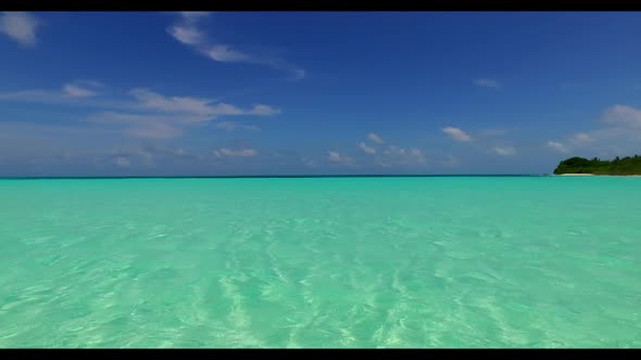 Aerial top view seascape of idyllic sea view beach lifestyle by blue ocean with white sand backgroun