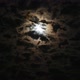 Time-Lapse of Clouds in the Night Sky Against the Background of a Bright Full Moon - VideoHive Item for Sale