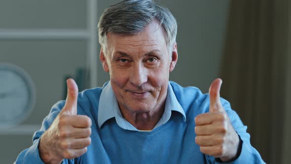 Portrait of Happy Mature Elderly Man Showing Two Thumbs Up Smiling Pensioner Looking at Camera