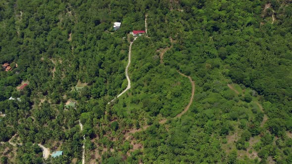 Aerial View of Thailand Island Jungle with Road and House