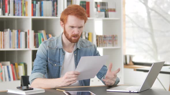 Angry Casual Redhead Man Tearing Contract, Torn