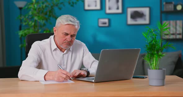 Confused Senior Retired Man Checking Calculating Bills Bank Loan Payment Doing Paperwork Discuss