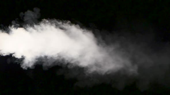 Cloud of Smoke on Isolated Black Studio Background, Slow Motion