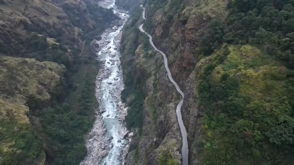 Road carved into the cliffs following the Marsyangdi River