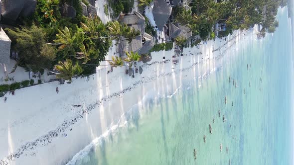 Vertical Video of the Ocean Near the Coast of Zanzibar Tanzania Aerial View