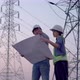 Two specialist electrical engineer working near to High voltage tower. - VideoHive Item for Sale