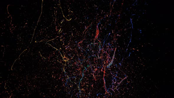 Rainbow color paint explodes and splashes. Slow Motion. alt