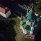 Aerial View of St. Andrews Church, Orthodox Church on Green Hill in the City - VideoHive Item for Sale