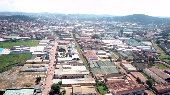 Drone flyover industrial area in capital of Uganda, Kampala city. Bugolobi during sunny day