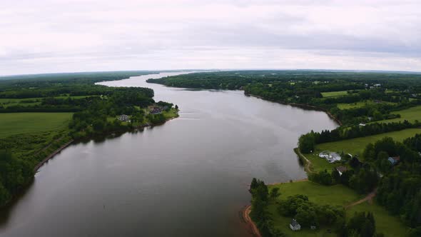 River leading to Georgetown Harbour, outside Montague, Prince Edward Island on a cloudy summer day.