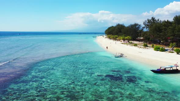 Aerial scenery of perfect bay beach break by blue ocean with white sandy background of a dayout near