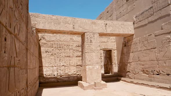 Preserved pillar in ancient temple, Habu Temple, Luxor, Egypt.