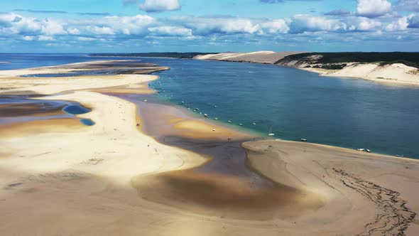 Banc d'Arguin South Passage in Arcachon Basin France with boats on the sandy shore, Aerial approach