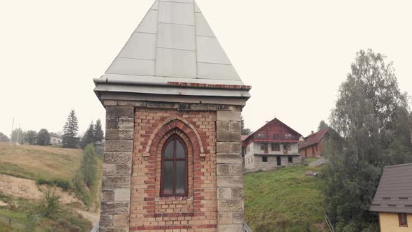 Old Brick Tower with Arched Windows