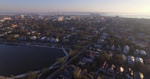 Aerial Flyover of Downtown Charleston SC and Colonial Lake in Early Morning