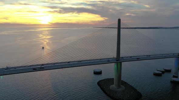 Video of Sunshine Skayway Bridge in Florida during sunset in evening light with flowing traffic