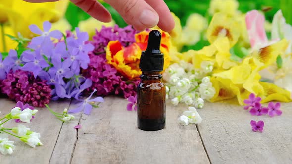 Essential Oil and Flower Extract in a Small Bottle
