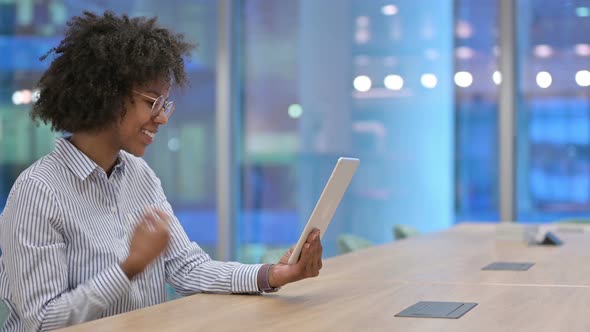 Cheerful African Businesswoman Doing Video Call on Tablet 