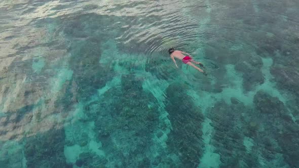 Snorkler Swimming in Blue Ocean, Aerial