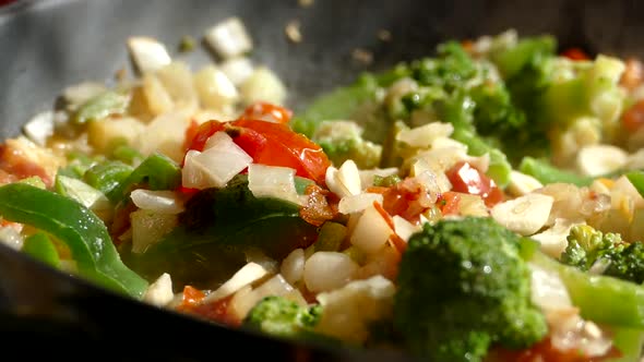 Lunch of Vegetables. Cook the Vegetable Stew in a Pan. Frozen Vegetables on a Salad. Semi-finished