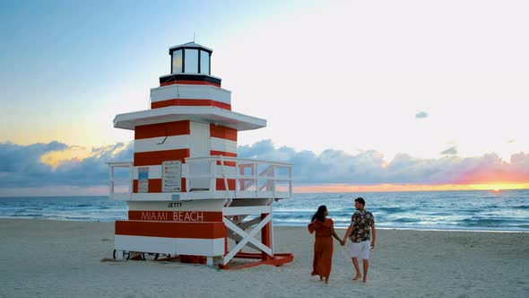 Miami South Beach Sunrise with Lifeguard Tower and Coastline with Colorful Cloud and Blue Sky South