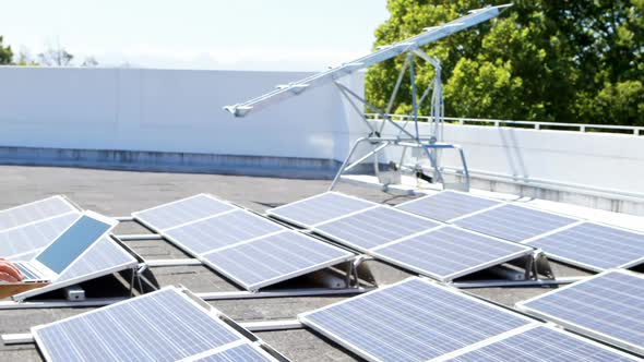 Male worker using laptop at solar station 4k