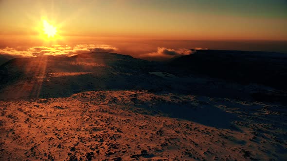 Snow Mountains at Sunset