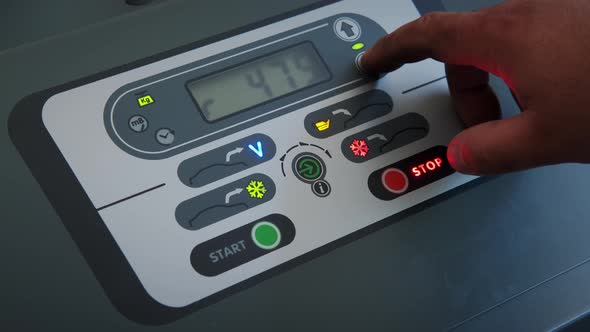 Close Up View of Man Check Air Conditioner in Car Service