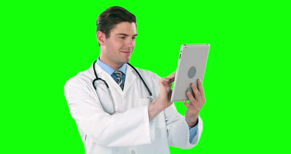 Doctor using digital tablet