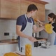 Young Couple Making Home Made Pasta at Kitchen - VideoHive Item for Sale