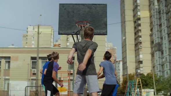 Streetball Teenager Missing a Free Throw Outdoors