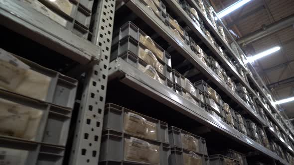 Filled Shelves in Factory Warehouse Bottom Angle 4K