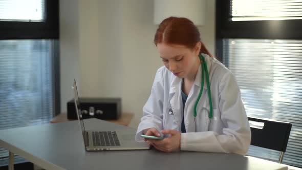 Tracking Shot of Happy Seriuos Female Doctor in White Coat Giving Fast Remote Diagnose the Patients