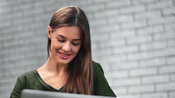 Closeup Woman Chatting Use Laptop at White Loft Background