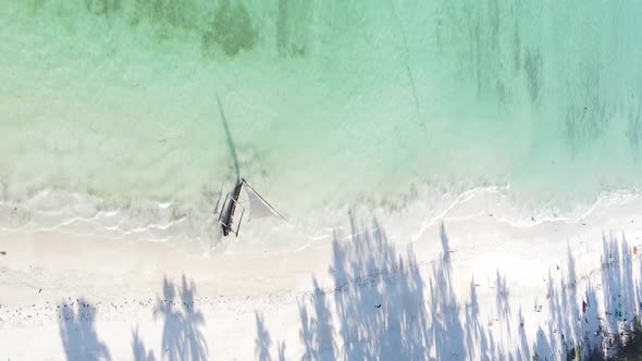 Vertical Video Boats in the Ocean Near the Coast of Zanzibar Tanzania Aerial View