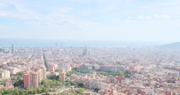 Barcelona city view at sunny day, Sagrada Familia landmark. Cityscape footage