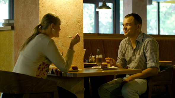 Young Couple in A Cafe