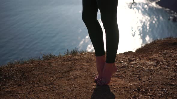 Young Caucasian Woman with Curly Blond Hair and Freckles Fitness Instructor in Sportswear Doing