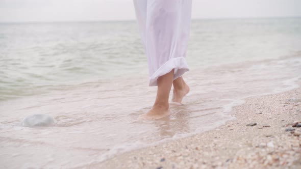 Barefoot Alone Woman Walking Over Sand Sea Beach