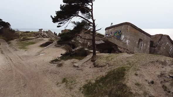 Aerial view of abandoned seaside fortification building at Karosta Northern Forts on the beach of Ba