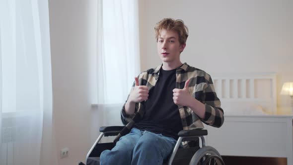 A Handsome Disabled Man is Showing a Thumbup