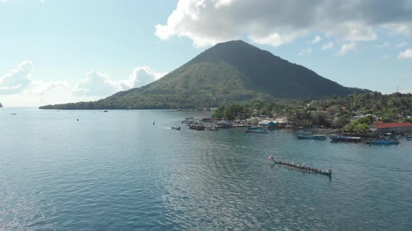 Aerial: kora-kora traditional canoe annual race in Banda Islands Indonesia