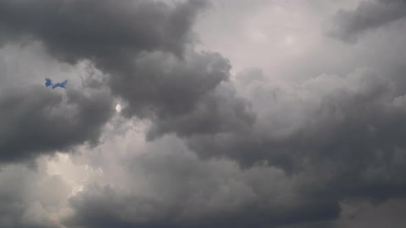 Dramatic sky with storm cloud on a cloudy day time lapse.