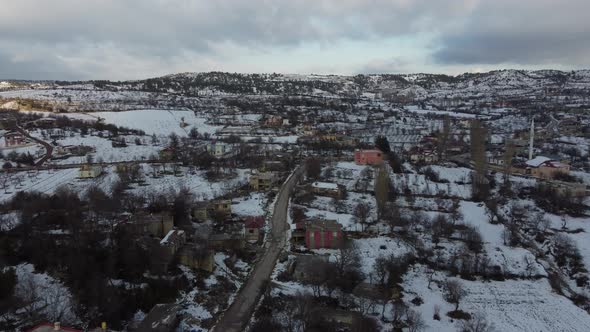 Snowy Village Landscape Drone View