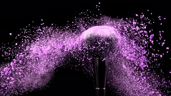 Super Slow Motion Shot of Violet Makeup Powder Falling From Facial Brush at 1000Fps