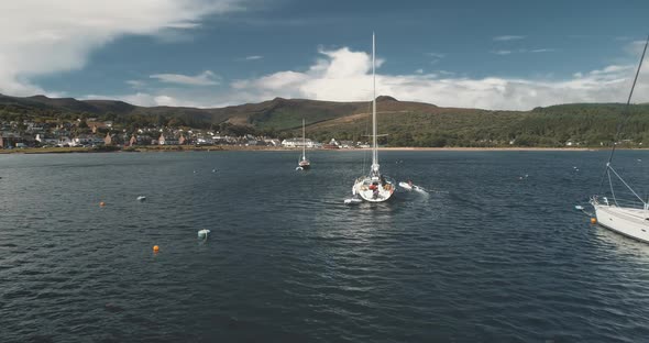 Boats at Ocean Coast of Green Mountains Island Aerial