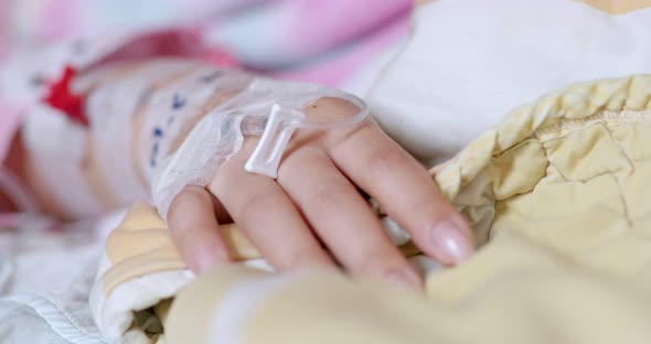 Woman get intravenous infusion in hospital